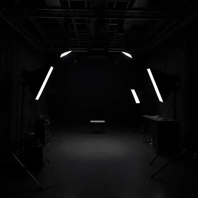 The Blackout Chamber studio, a dark room ready for precise, controlled lighting setups.